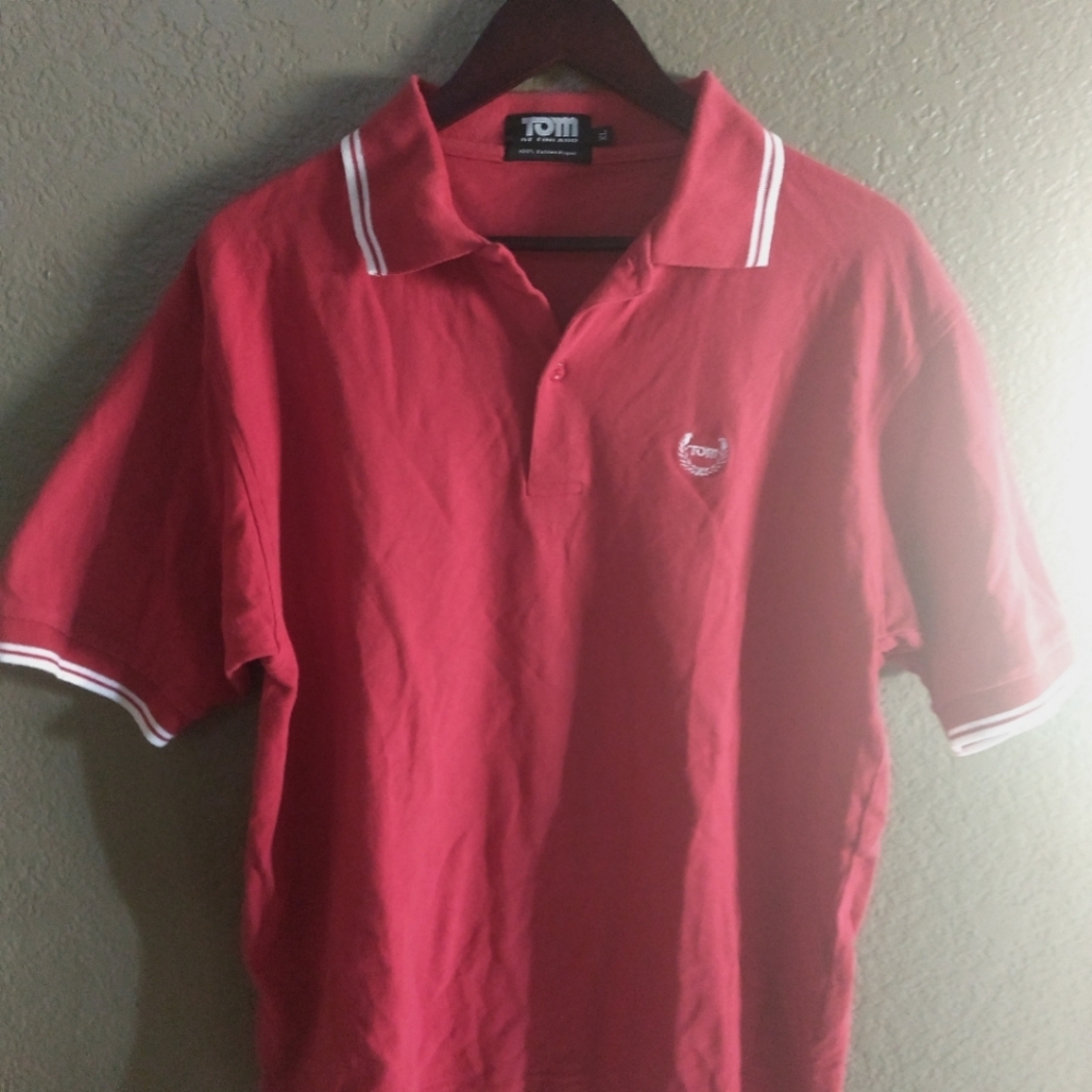 Red polo style dress shirt with ringer sleeves.